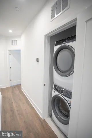 a view of a storage & utility room with washer and dryer