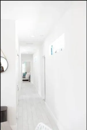 a view of a bedroom with a bed