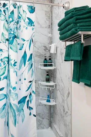 a picture of a bathroom with a sink and mirror