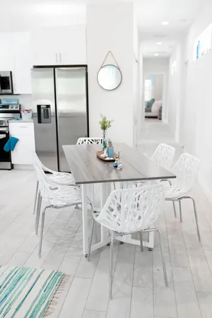 a view of a dining room with furniture