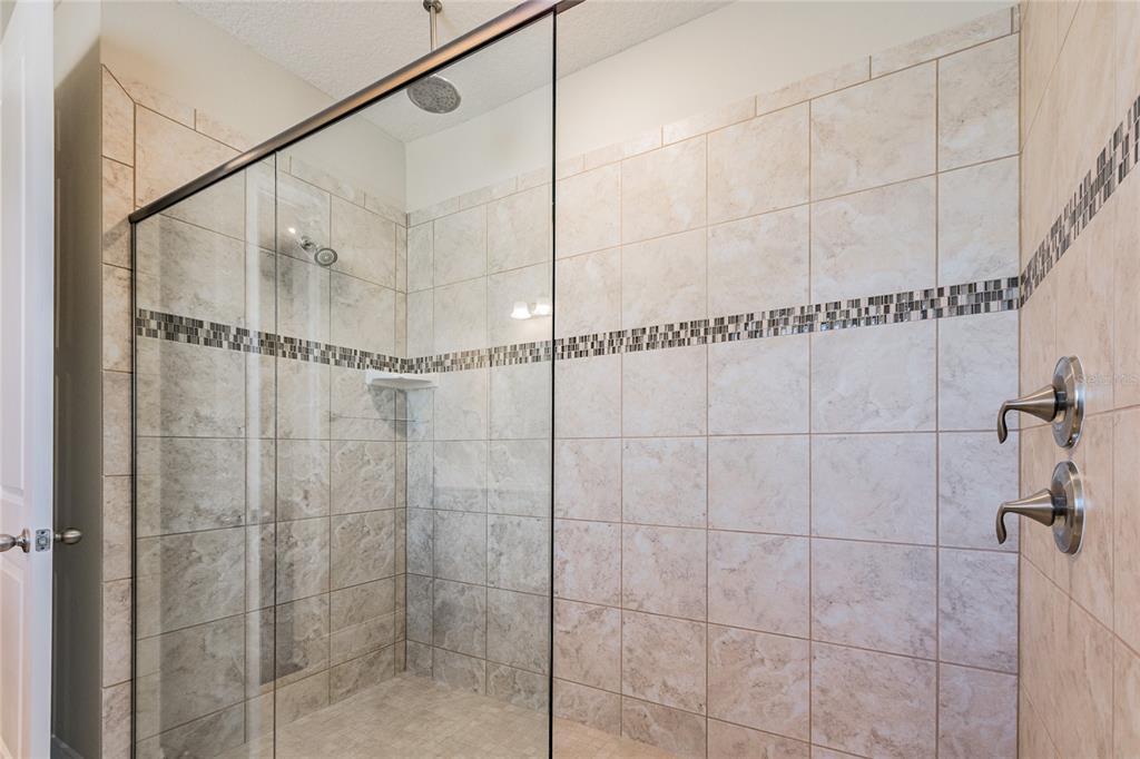 8278 Procida Isle Lane Windermere, FL 34786 - Photo 50 of 90 a bathroom with a shower