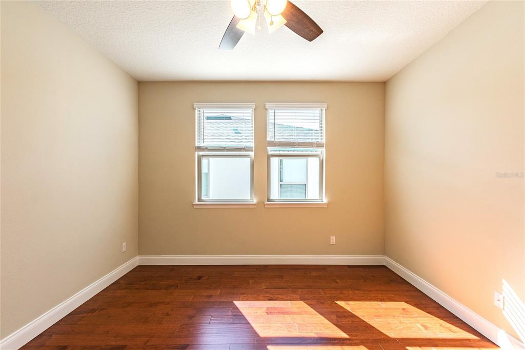 8278 Procida Isle Lane Windermere, FL 34786 - Photo 63 of 90 an empty room with a window