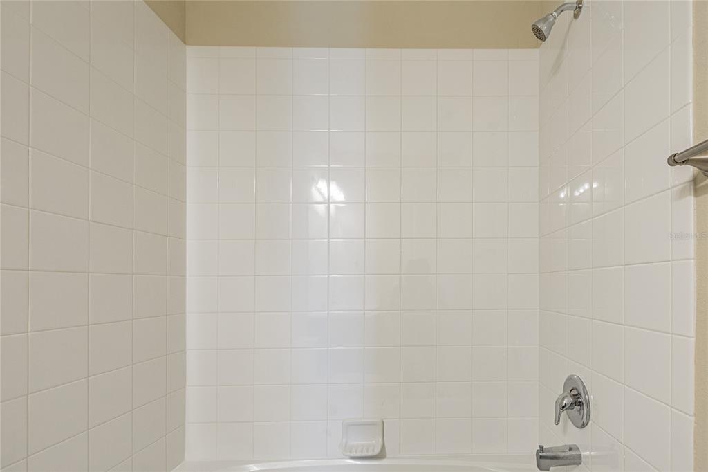 8278 Procida Isle Lane Windermere, FL 34786 - Photo 73 of 90 a bathroom with a shower