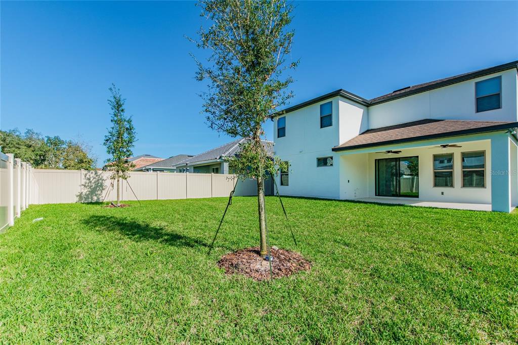 8278 Procida Isle Lane Windermere, FL 34786 - Photo 85 of 90 a house view with a garden space