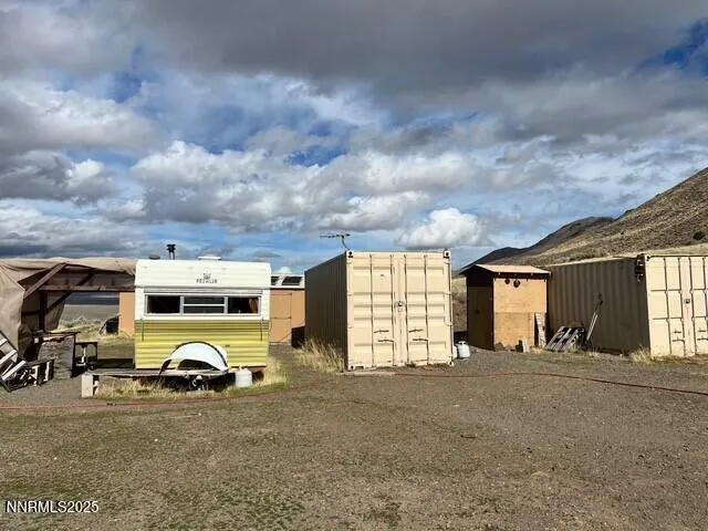 a view of a cars park in front of house
