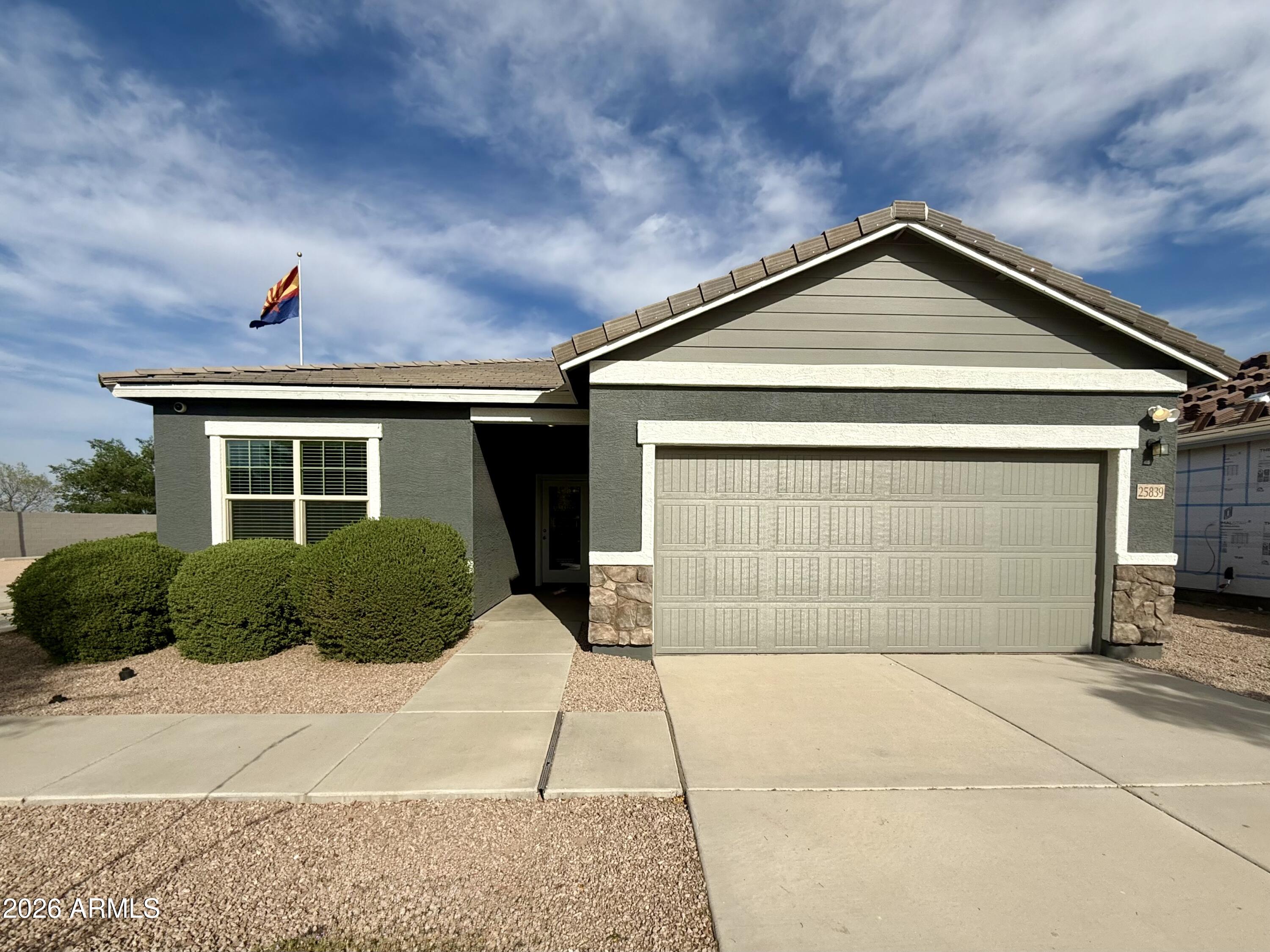 25839 North Boreas Road Florence, AZ 85132 - Photo 1 of 20 a front view of a house with a yard