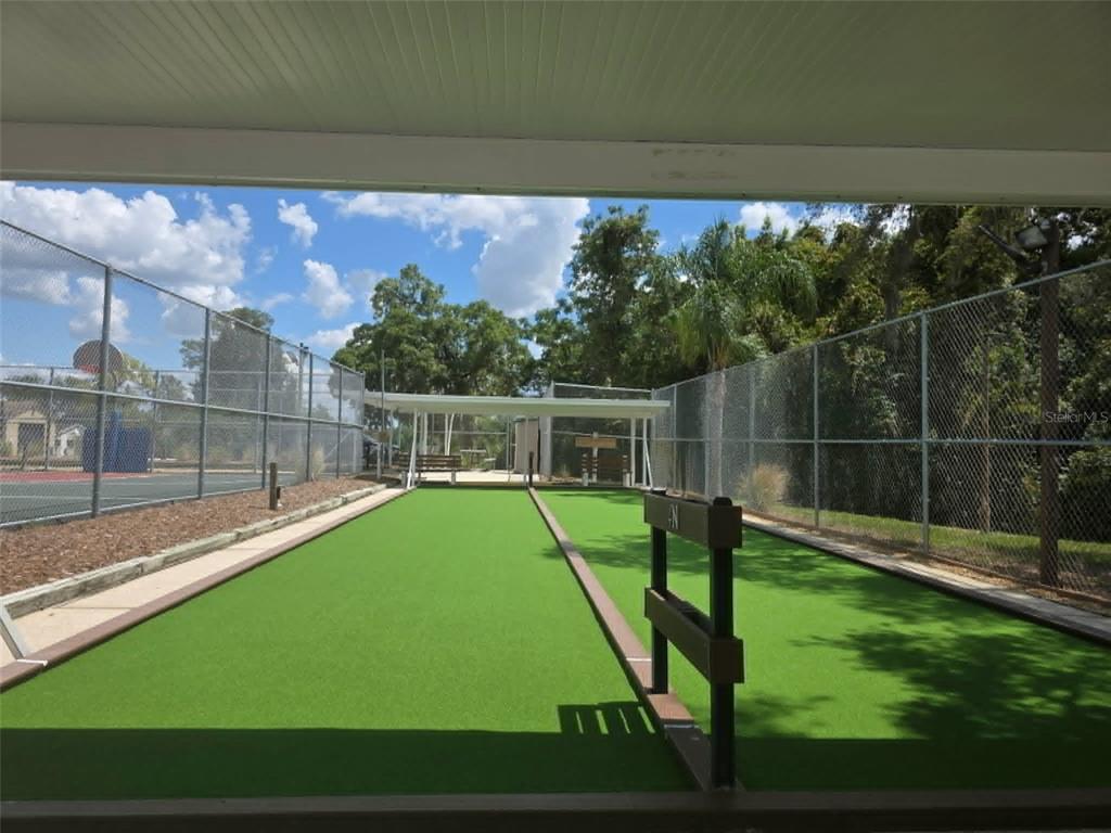 4392 Craftsbury Drive New Port Richey, FL 34652 - Photo 37 of 41 a view of a backyard with a garden and plants
