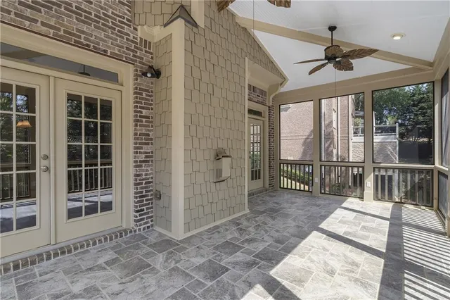 a view of a room with windows