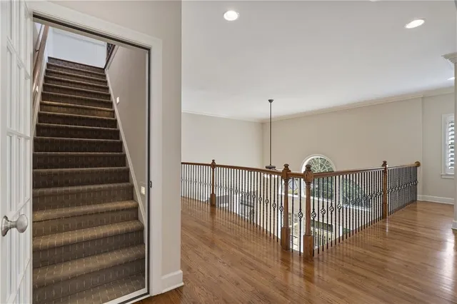 a view of entryway with wooden floor