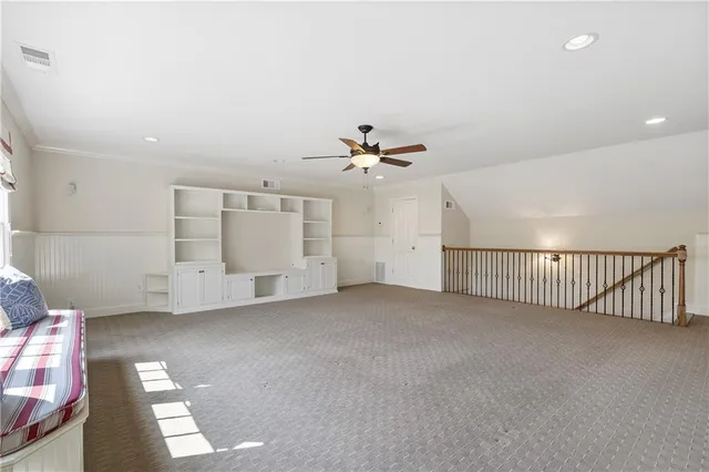 a view of a livingroom with a staircase