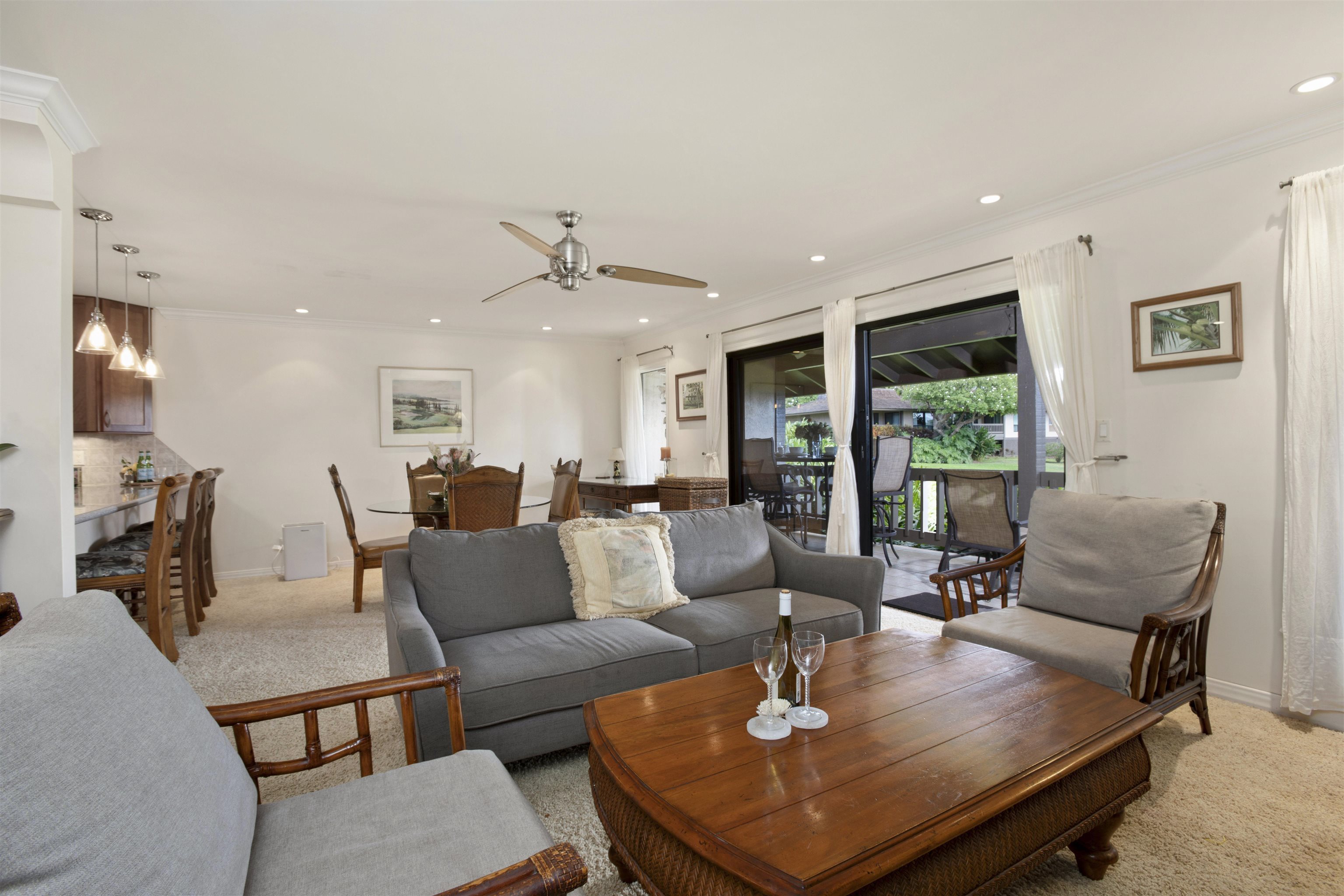 150 Puukolii Road, Unit 41 Lahaina, HI 96761 - Photo 11 of 34 a living room with furniture kitchen view and a large window