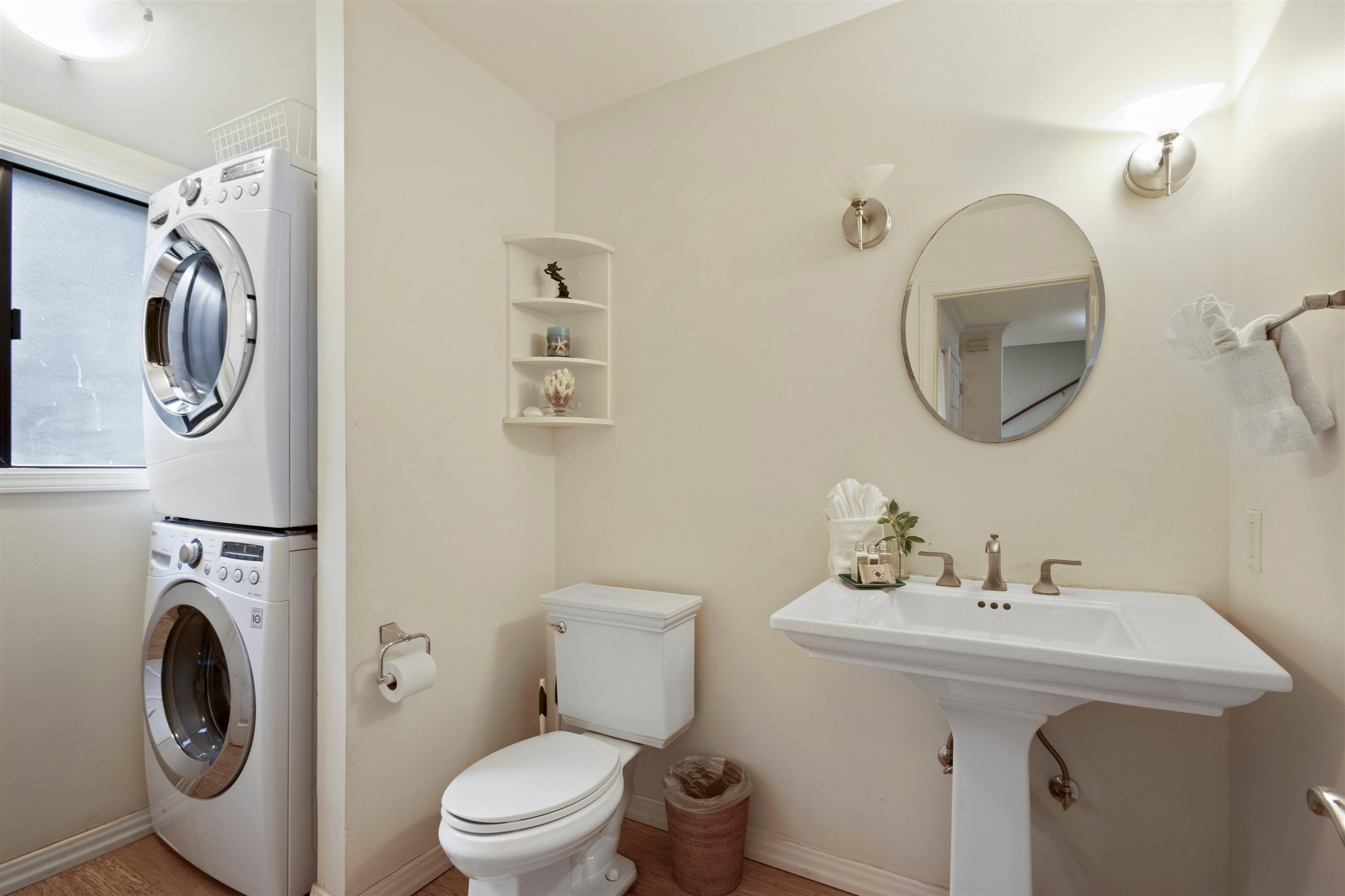 150 Puukolii Road, Unit 41 Lahaina, HI 96761 - Photo 21 of 34 a bathroom with a toilet sink and mirror