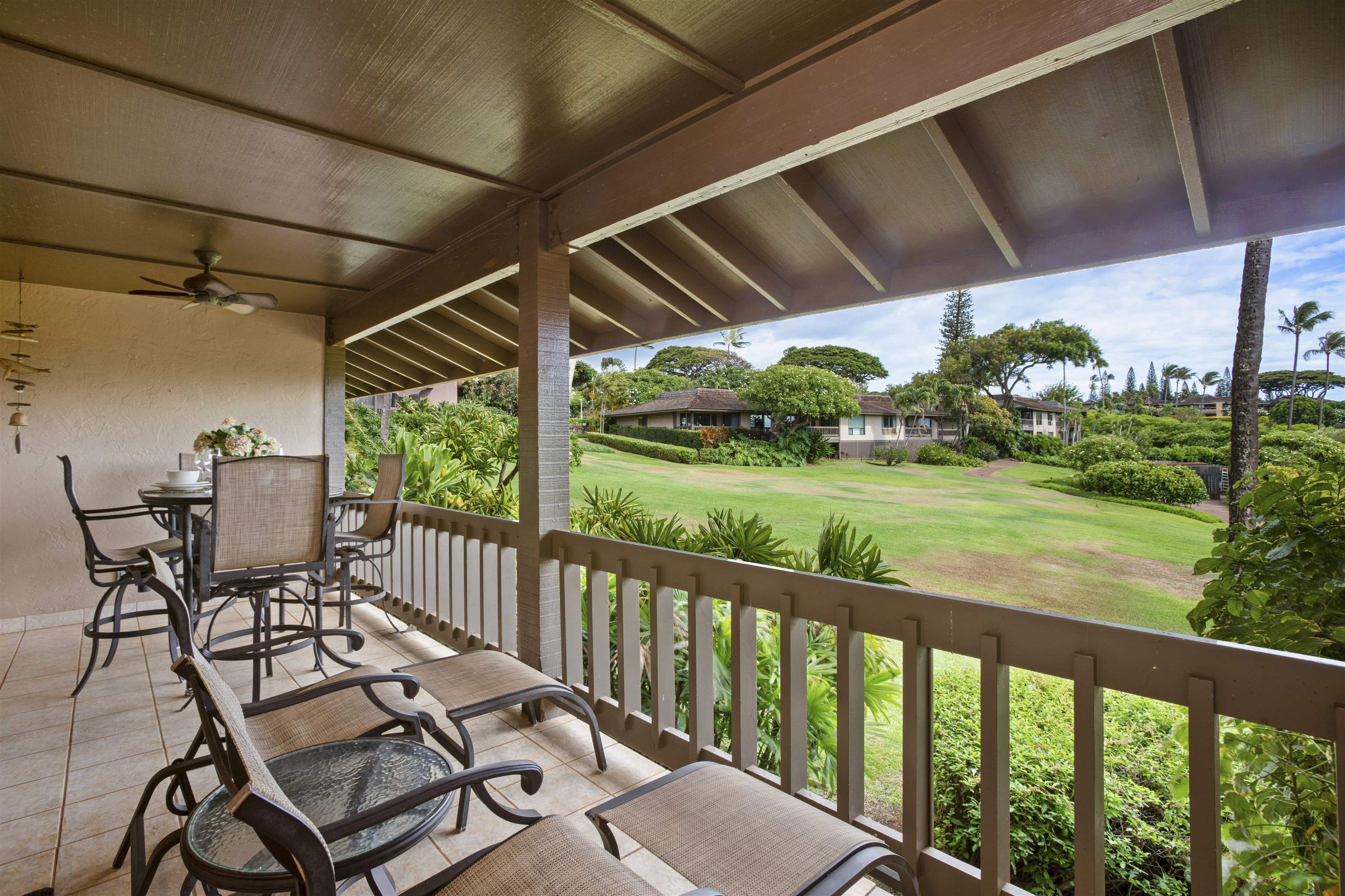 150 Puukolii Road, Unit 41 Lahaina, HI 96761 - Photo 23 of 34 a view of a patio with table and chairs