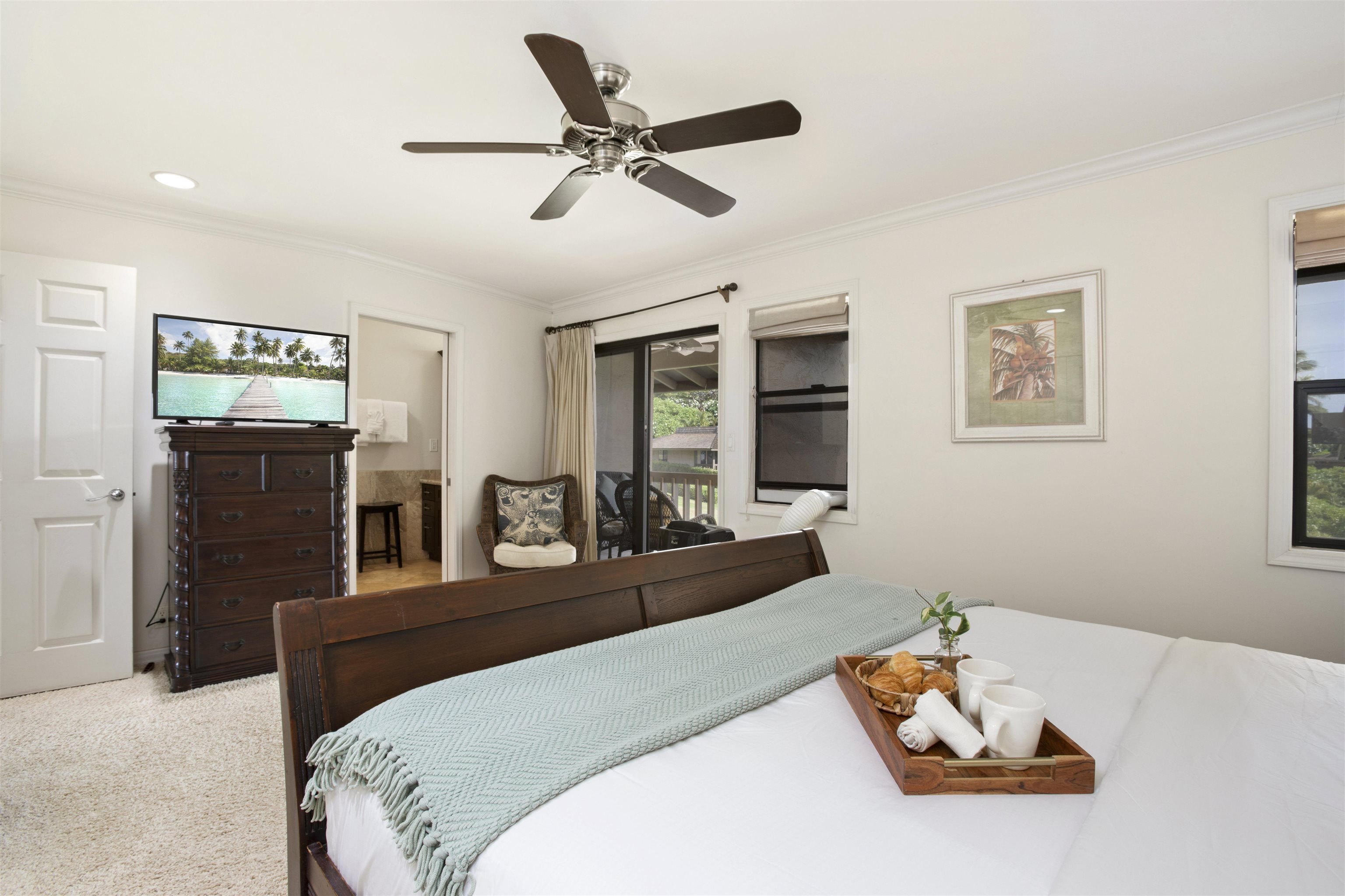 150 Puukolii Road, Unit 41 Lahaina, HI 96761 - Photo 30 of 34 a bedroom with a bed and furniture