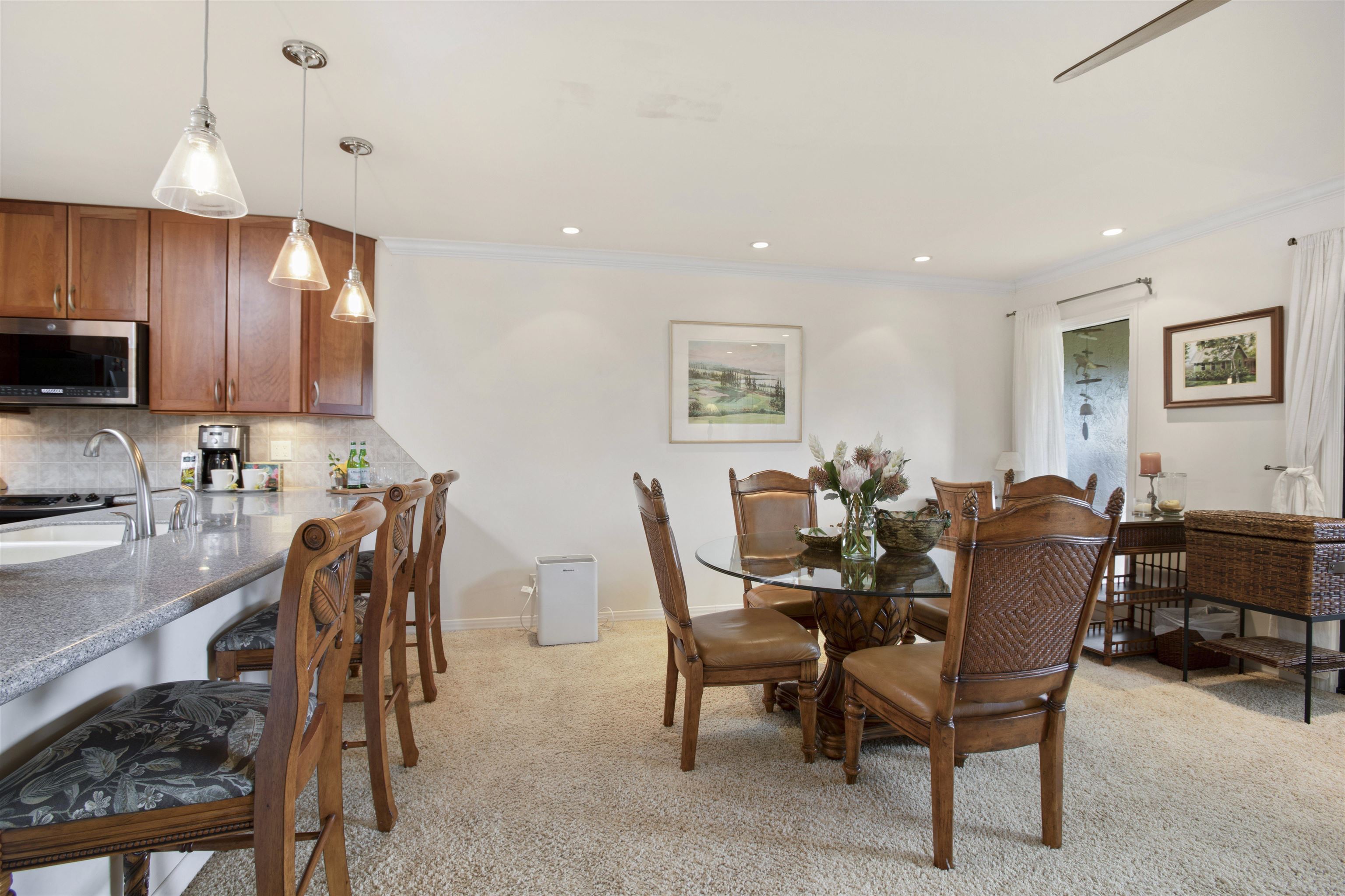 150 Puukolii Road, Unit 41 Lahaina, HI 96761 - Photo 3 of 34 a view of a dining room with furniture