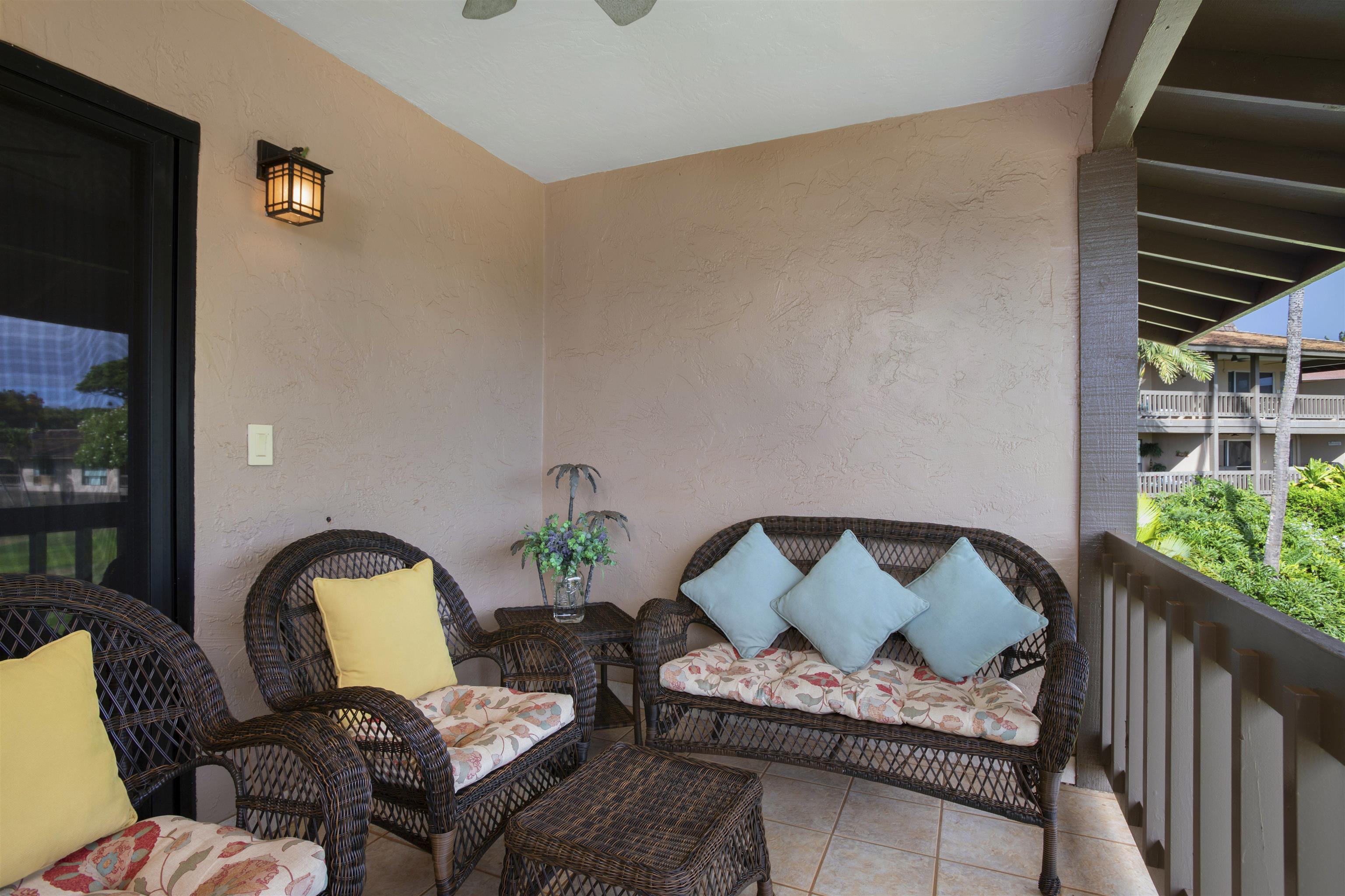 150 Puukolii Road, Unit 41 Lahaina, HI 96761 - Photo 33 of 34 a living room with furniture and plants
