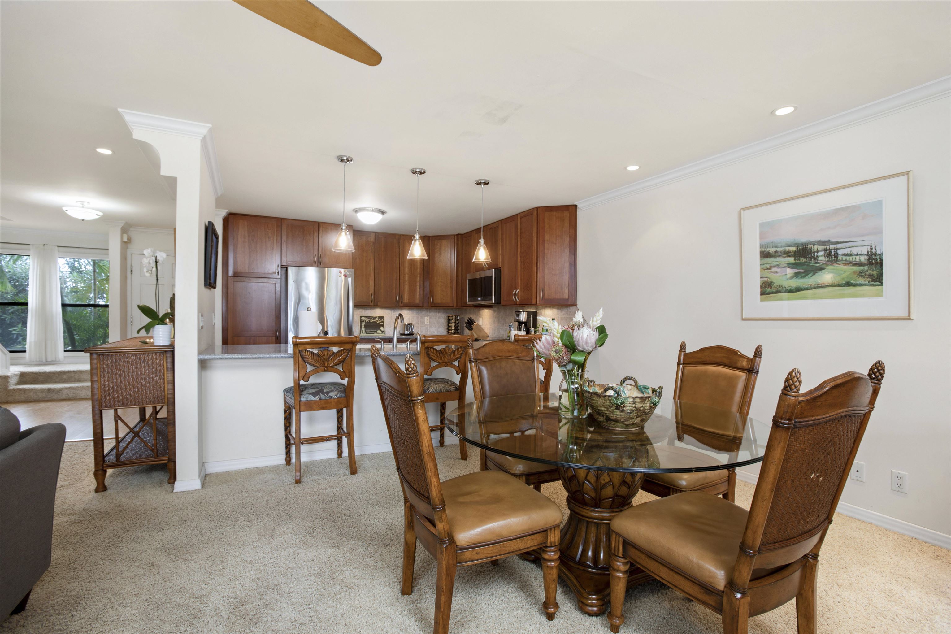 150 Puukolii Road, Unit 41 Lahaina, HI 96761 - Photo 4 of 34 a view of a dining room with furniture