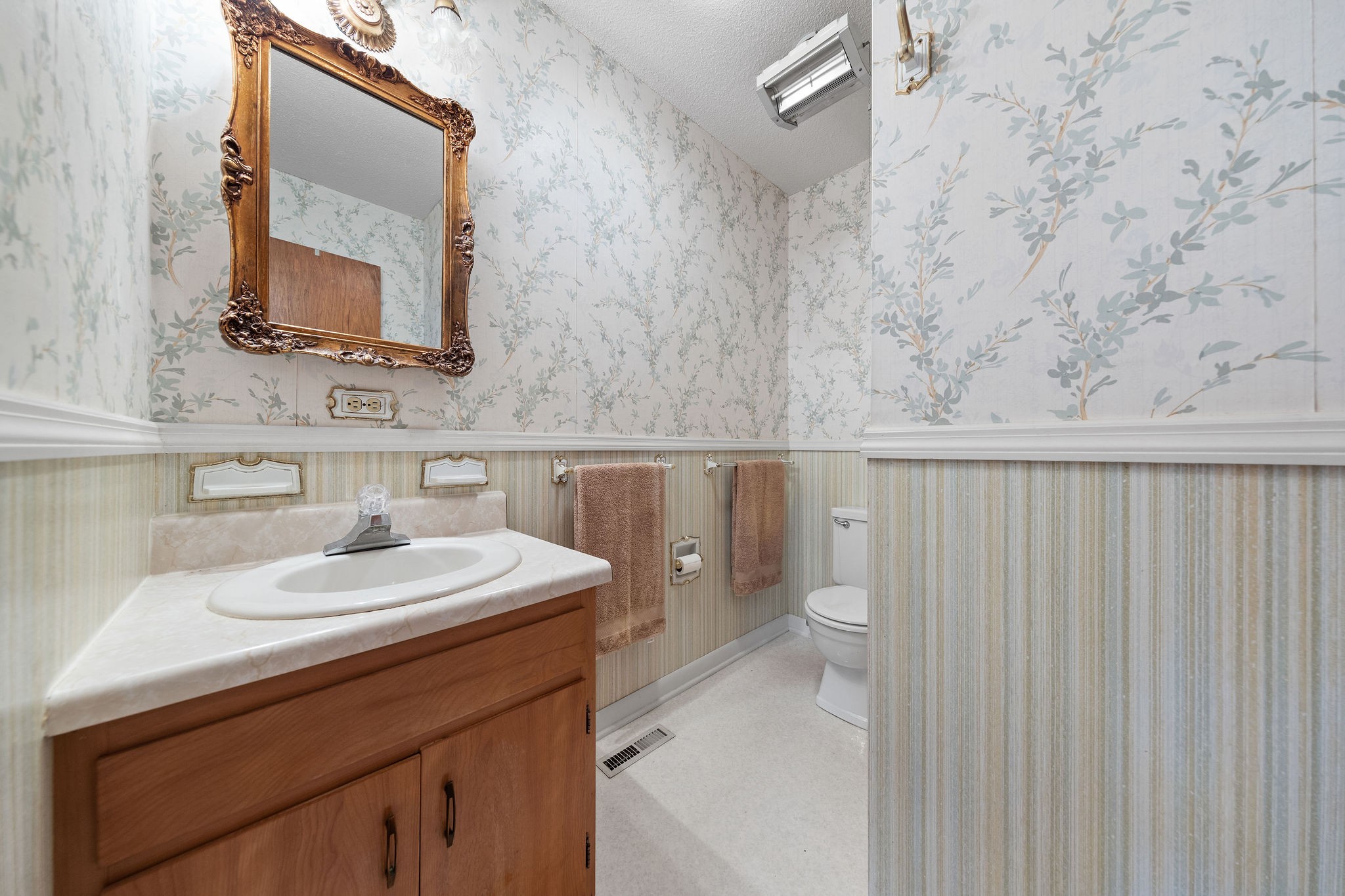 3008 Seminole Loop Crossville, TN 38572 - Photo 17 of 29 a bathroom with a sink a toilet and mirror
