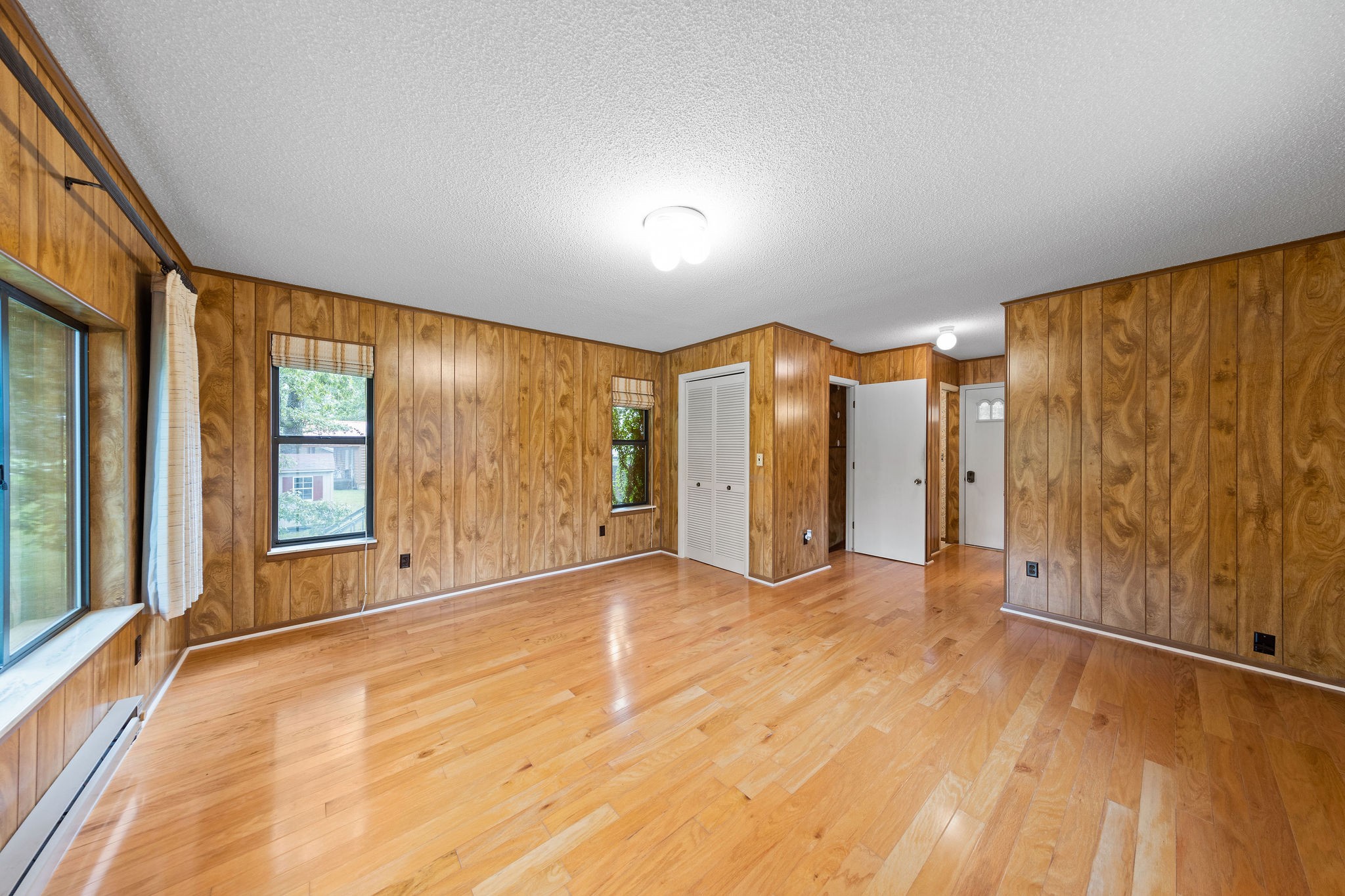 3008 Seminole Loop Crossville, TN 38572 - Photo 20 of 29 wooden floor in an empty room with a window