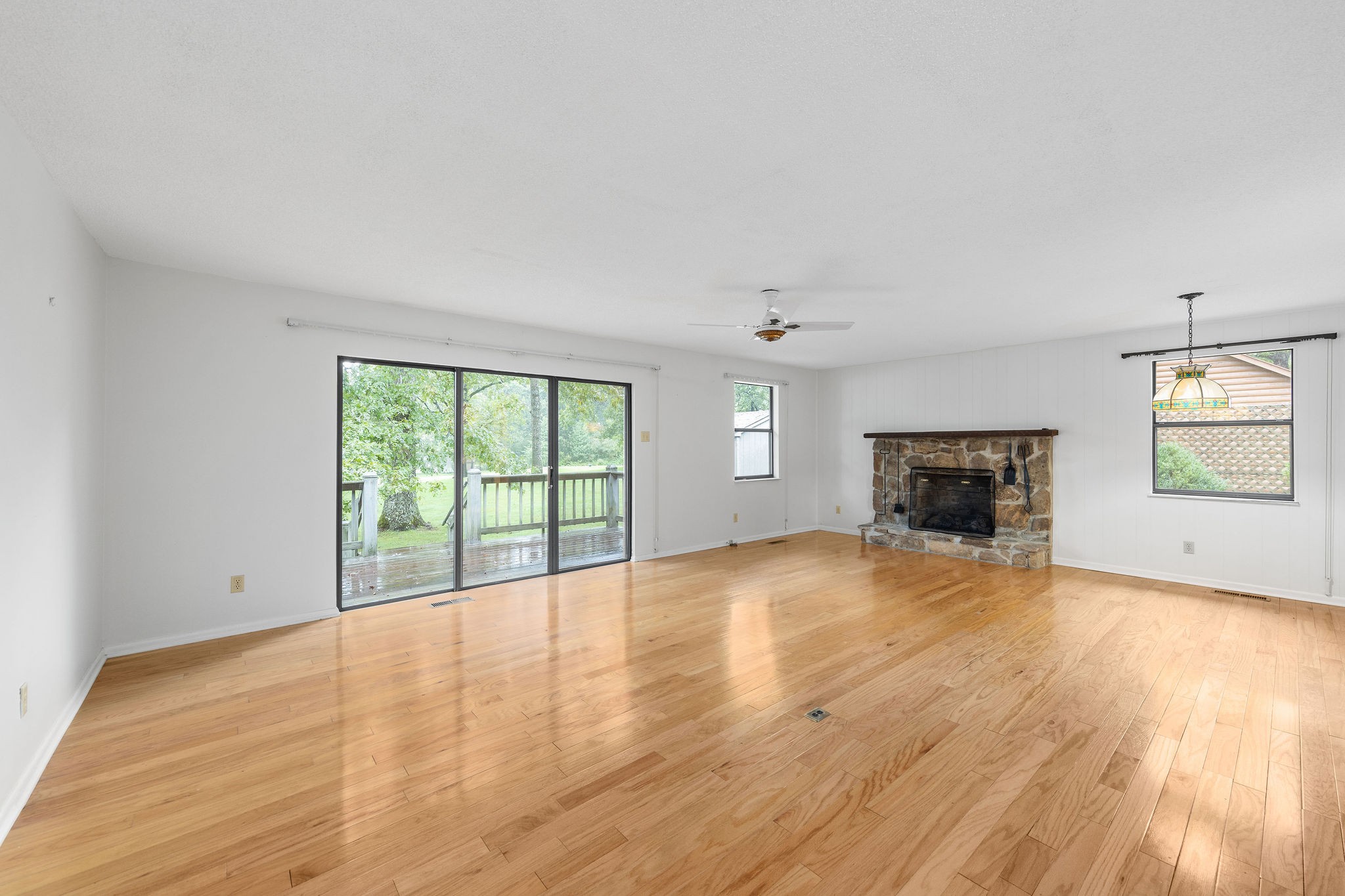 3008 Seminole Loop Crossville, TN 38572 - Photo 4 of 29 wooden floor fireplace and windows in an empty room