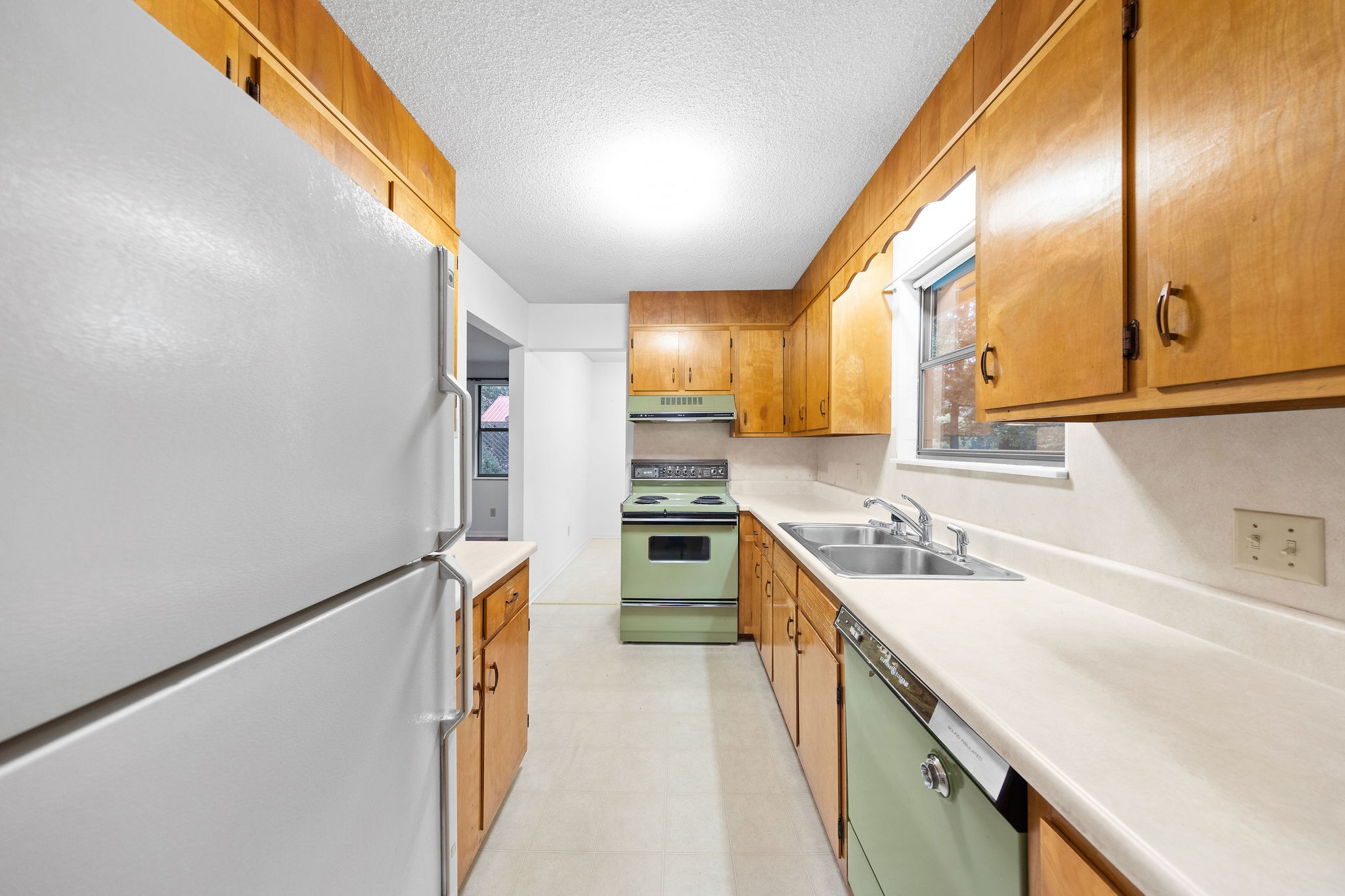 3008 Seminole Loop Crossville, TN 38572 - Photo 10 of 29 a kitchen with stainless steel appliances a sink and a refrigerator