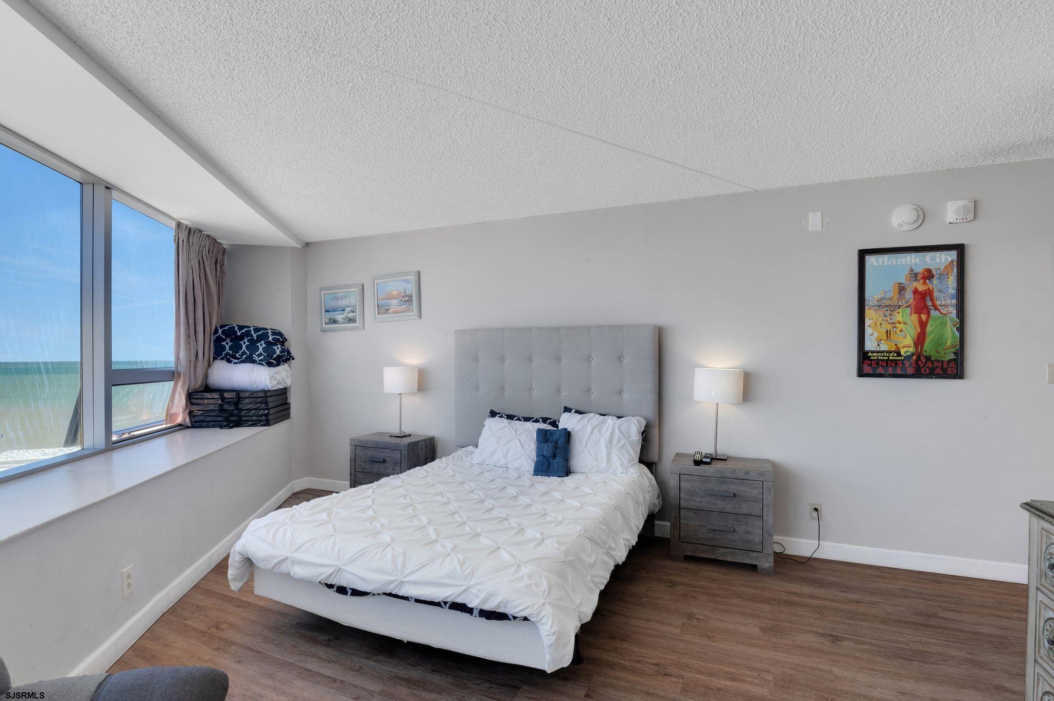 1515 Boardwalk, Unit 1004 Atlantic City, NJ 08401 - Photo 15 of 19 a bedroom with a bed and window