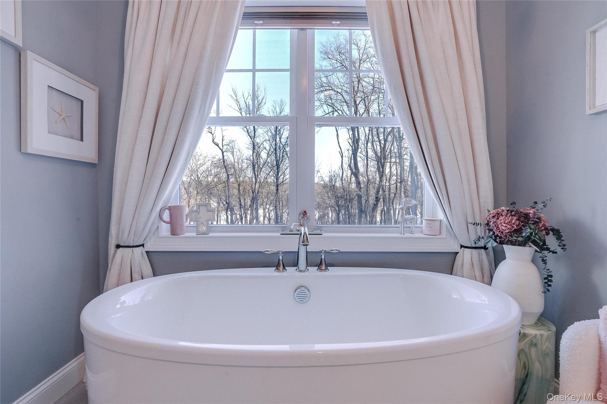23 Swan Holw Road New Windsor, NY 12553 - Photo 15 of 28 A spa-like primary bathroom showcases a soaking tub, oversized walk-in shower, and double vanity, creating the perfect space to relax and recharge.