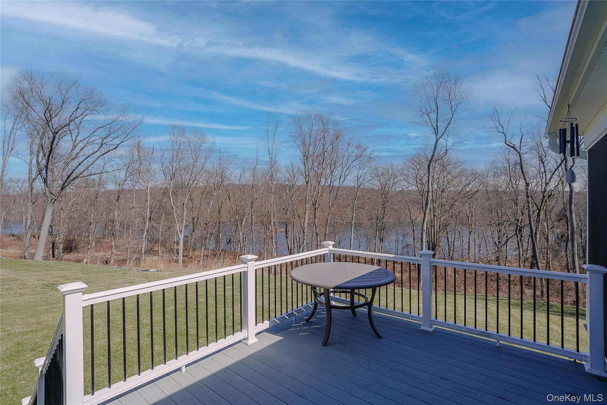 23 Swan Holw Road New Windsor, NY 12553 - Photo 23 of 28 Enjoy outdoor living on the Trex deck, perfectly positioned to take in peaceful reservoir views.
