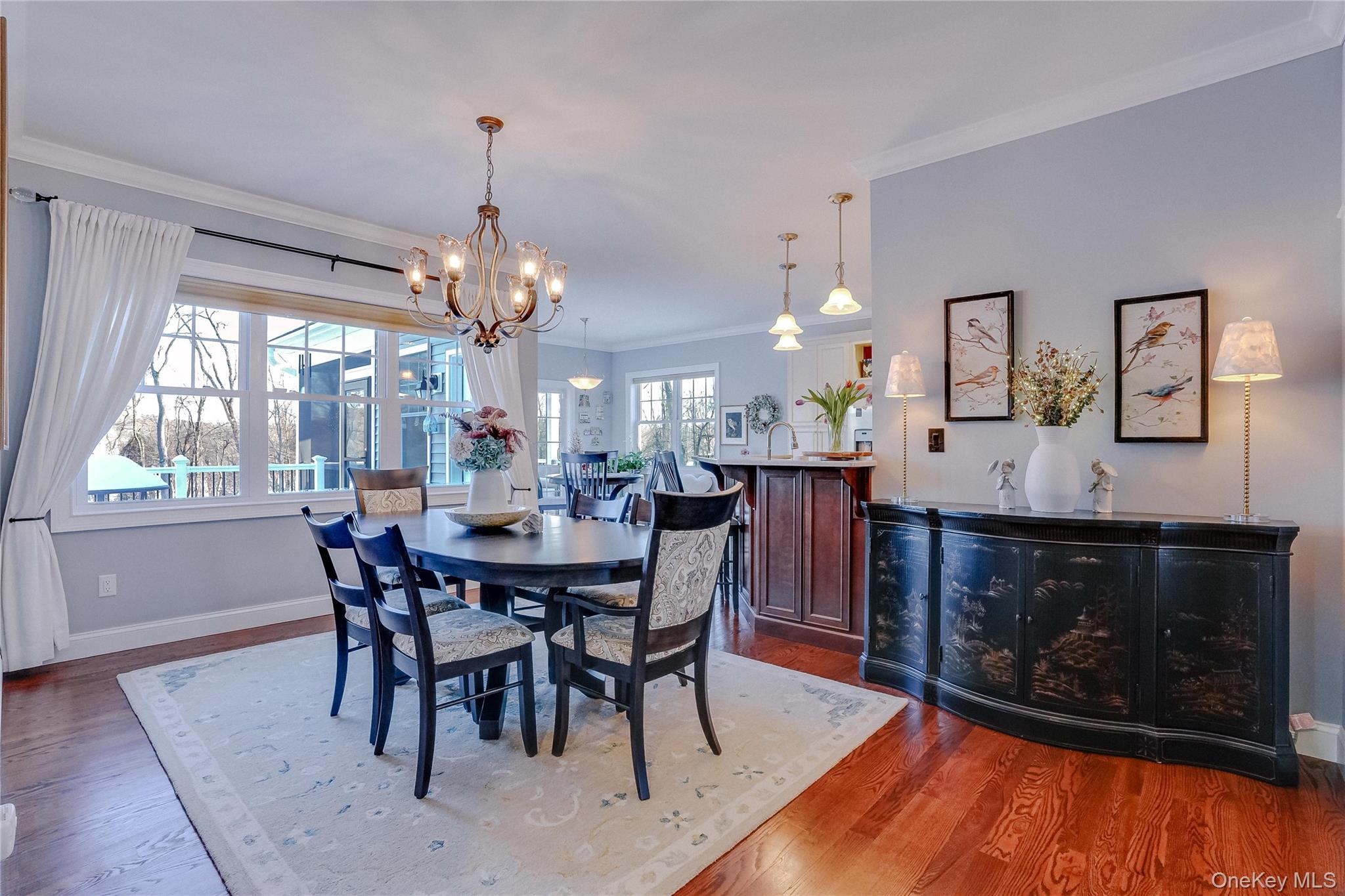 23 Swan Holw Road New Windsor, NY 12553 - Photo 9 of 28 A gorgeous dining room features hardwood floors, custom trim, and serene views overlooking the reservoir.