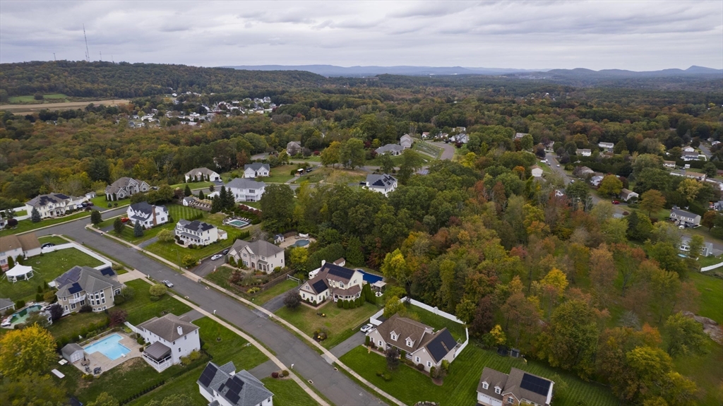 200 Anvil Street Feeding Hills, MA 01030 - Photo 7 of 12 an aerial view of lake and residential houses