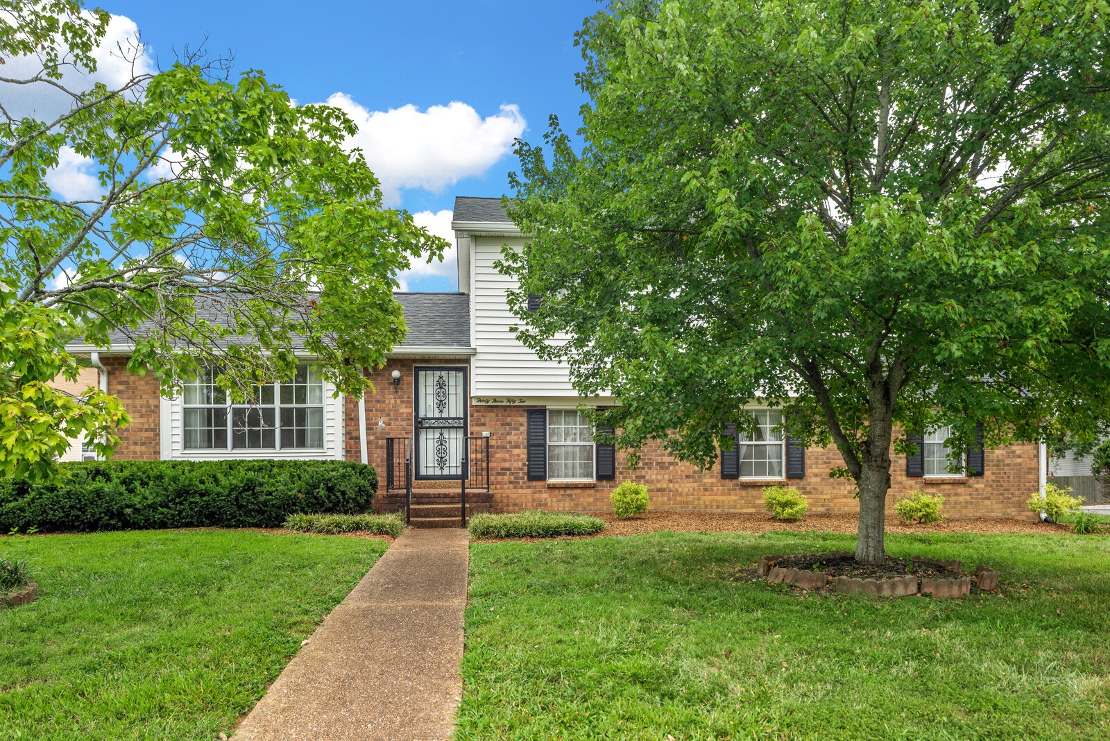 3352 Country Way Road Antioch, TN 37013 - Photo 2 of 26 a front view of a house with a yard