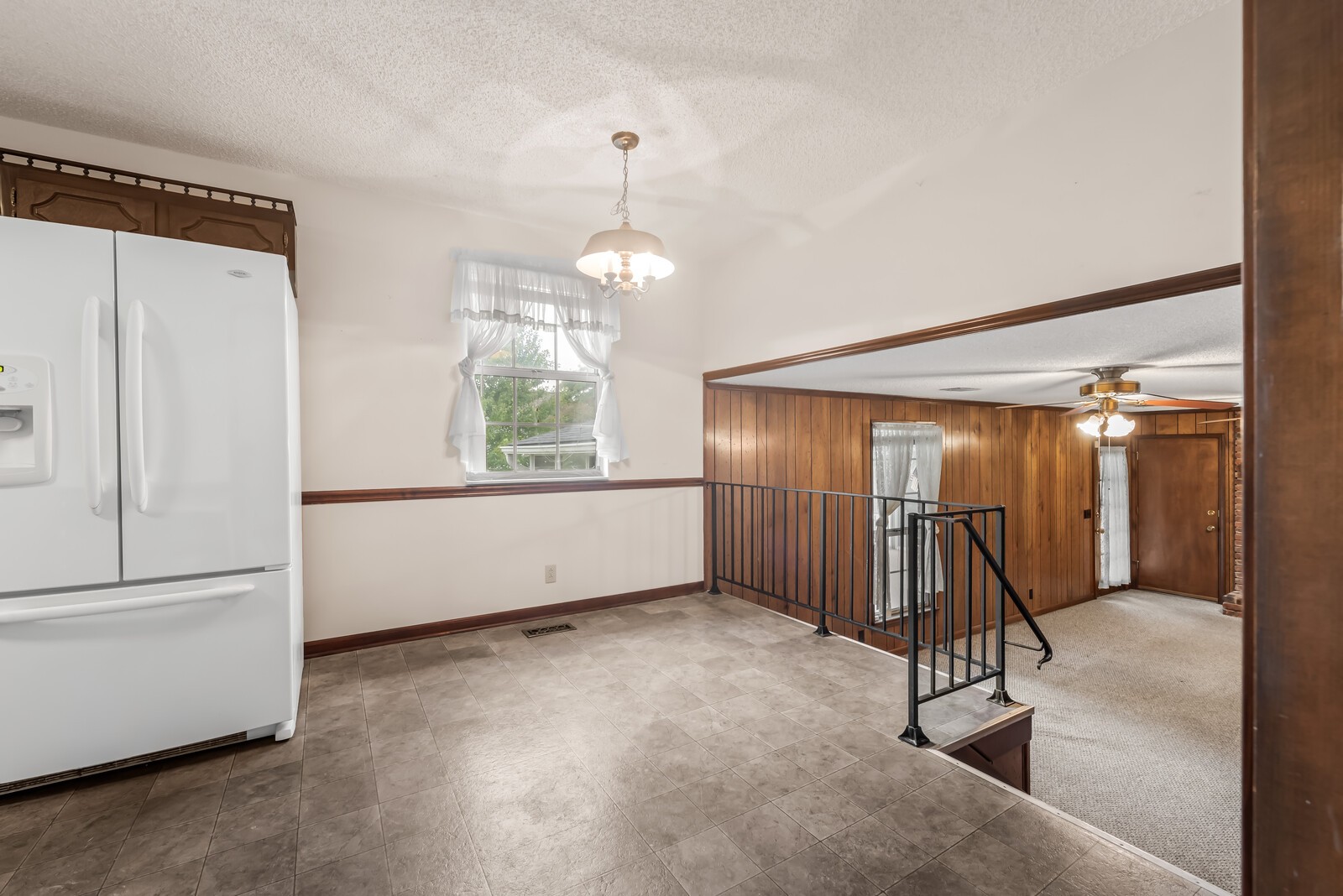 3352 Country Way Road Antioch, TN 37013 - Photo 6 of 26 a view of a livingroom with wooden floor and staircase