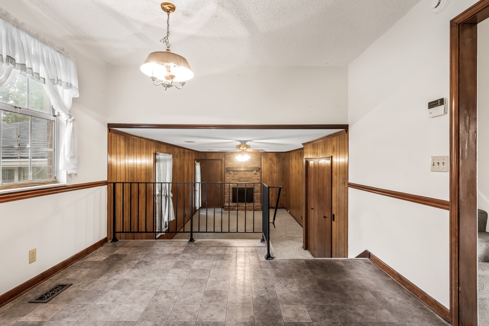3352 Country Way Road Antioch, TN 37013 - Photo 7 of 26 a view of a hallway with chandelier