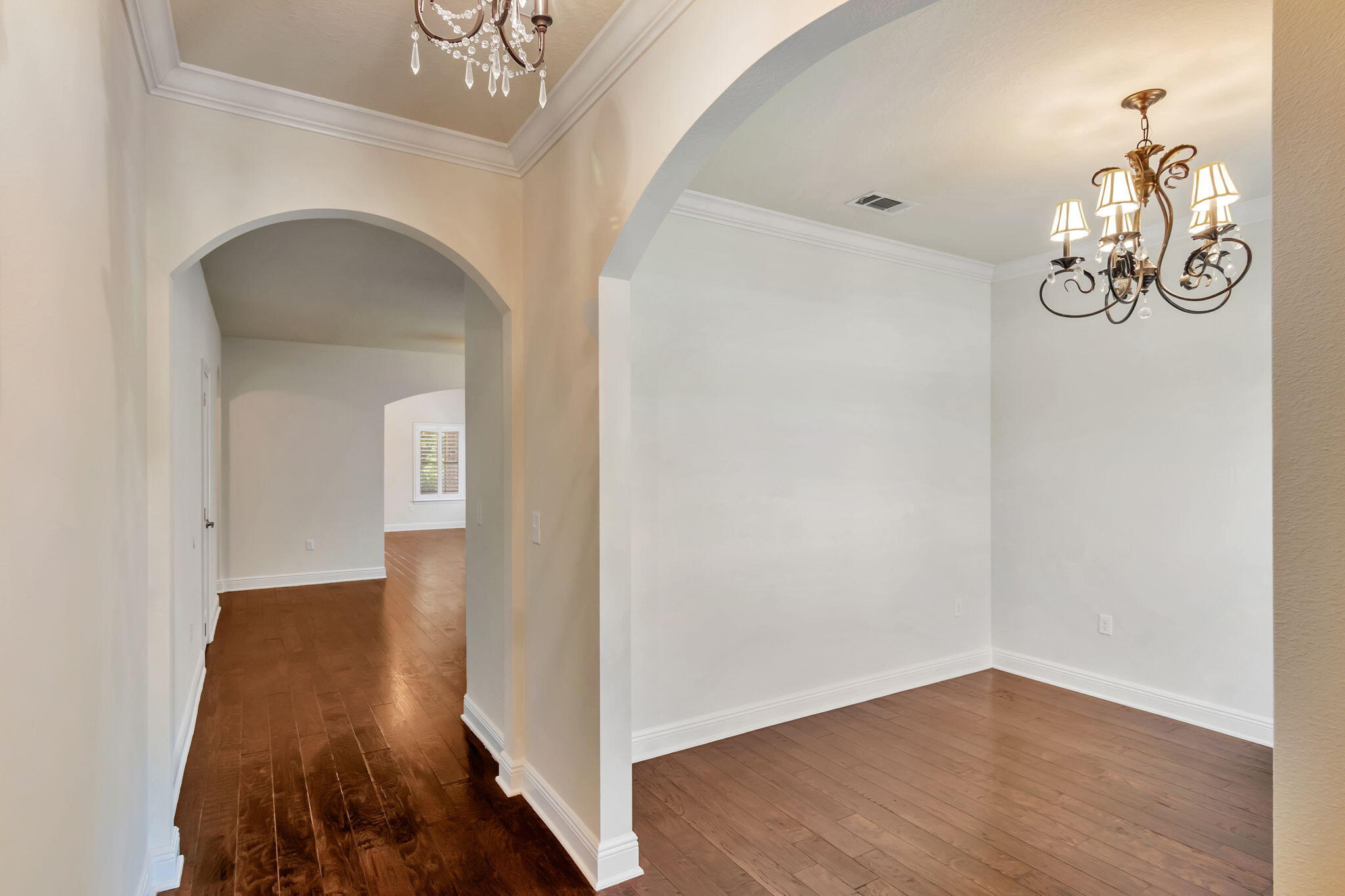 256 Cocobolo Drive Santa Rosa Beach, FL 32459 - Photo 17 of 45 an empty room with wooden floor and ceiling fan