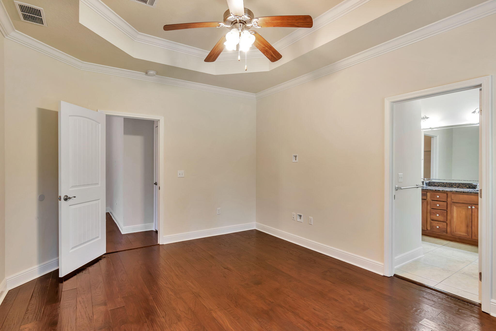 256 Cocobolo Drive Santa Rosa Beach, FL 32459 - Photo 23 of 45 wooden floor in an empty room with a window