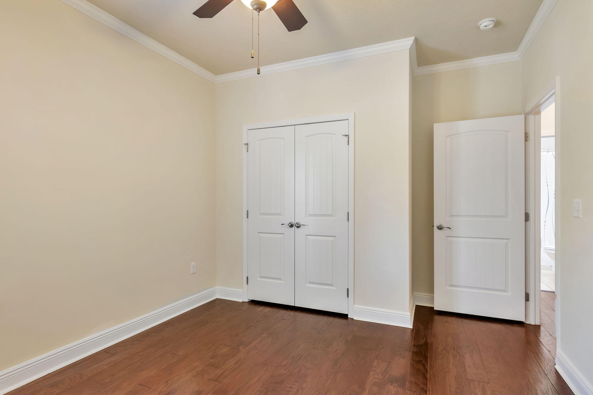256 Cocobolo Drive Santa Rosa Beach, FL 32459 - Photo 27 of 45 a view of an empty room with wooden floor