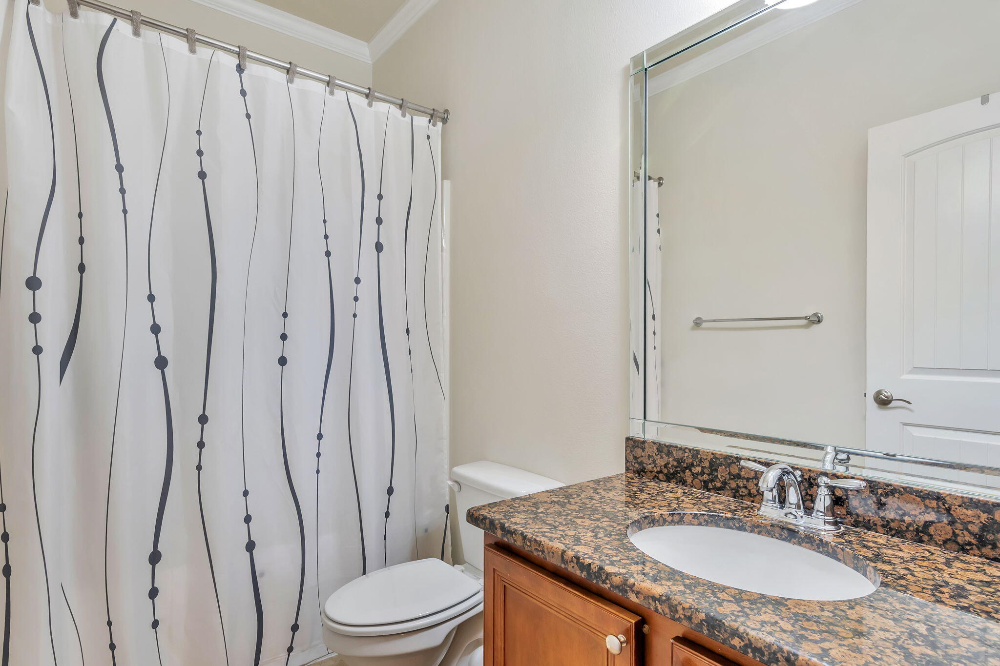 256 Cocobolo Drive Santa Rosa Beach, FL 32459 - Photo 31 of 45 a bathroom with a granite countertop sink toilet and shower