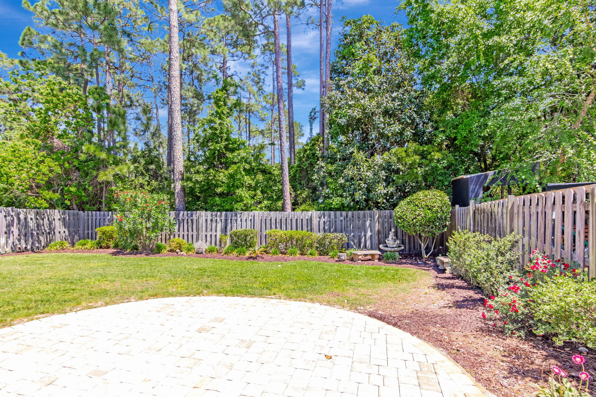 256 Cocobolo Drive Santa Rosa Beach, FL 32459 - Photo 41 of 45 a view of a backyard with a small pool and wooden fence