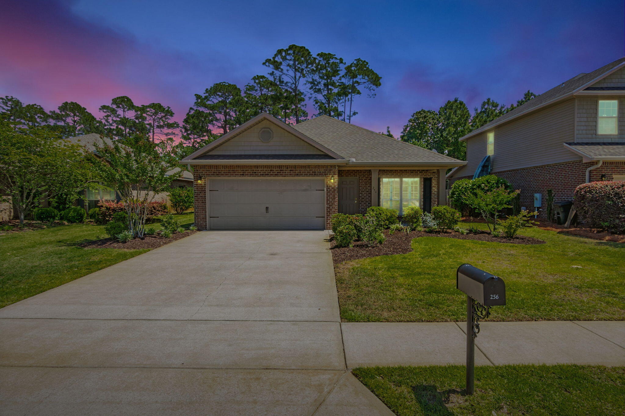 256 Cocobolo Drive Santa Rosa Beach, FL 32459 - Photo 44 of 45 a front view of a house with garden