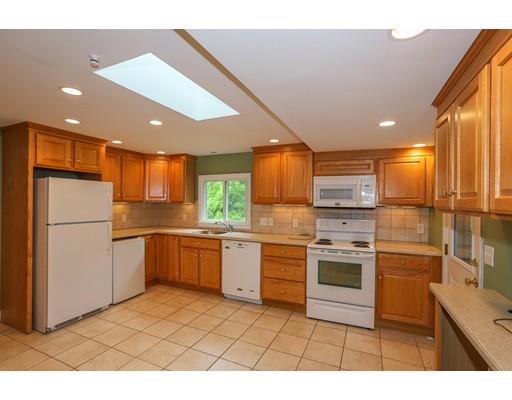 18 Ballardvale Road Andover, MA 01810 - Photo 13 of 28 a kitchen with a sink stainless steel appliances and cabinets