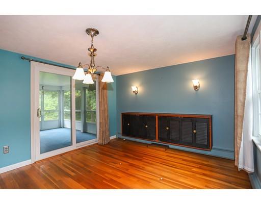 18 Ballardvale Road Andover, MA 01810 - Photo 25 of 28 a view of an empty room with a window and a kitchen