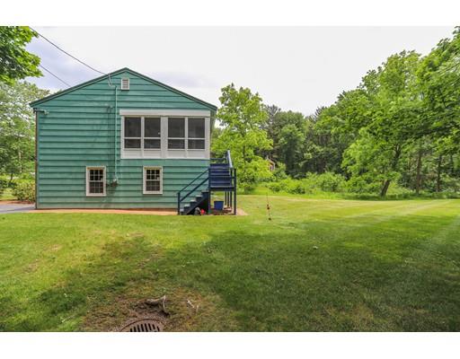 18 Ballardvale Road Andover, MA 01810 - Photo 4 of 28 a front view of a house with a yard