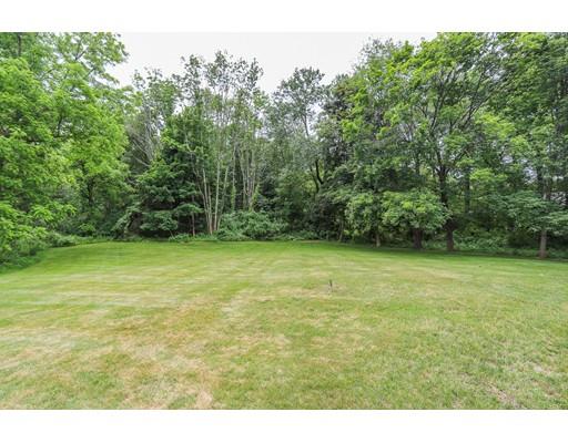18 Ballardvale Road Andover, MA 01810 - Photo 5 of 28 a view of a field with a trees in the background