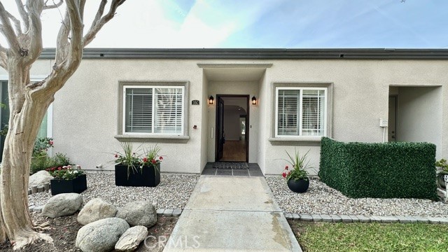 1921 St John Road, Unit 35C Seal Beach, CA 90740 - Photo 11 of 11 a view of a entryway door front of a house
