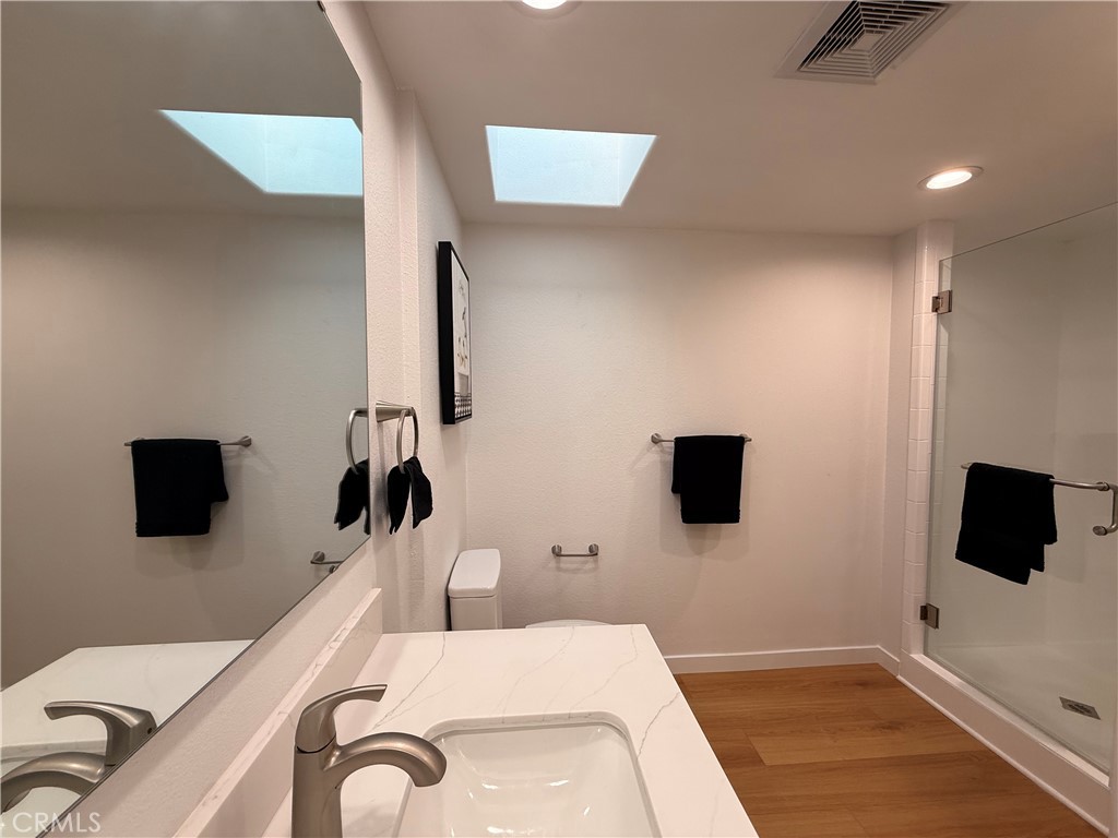 1921 St John Road, Unit 35C Seal Beach, CA 90740 - Photo 22 of 40 a view of a livingroom with a flat screen tv