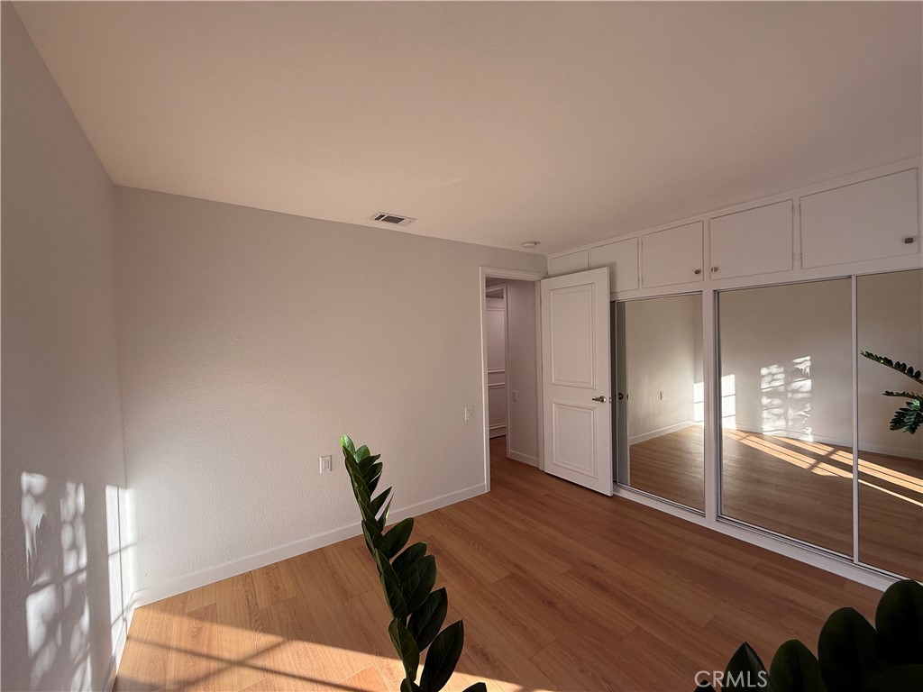 1921 St John Road, Unit 35C Seal Beach, CA 90740 - Photo 26 of 40 a view of a room with wooden floor