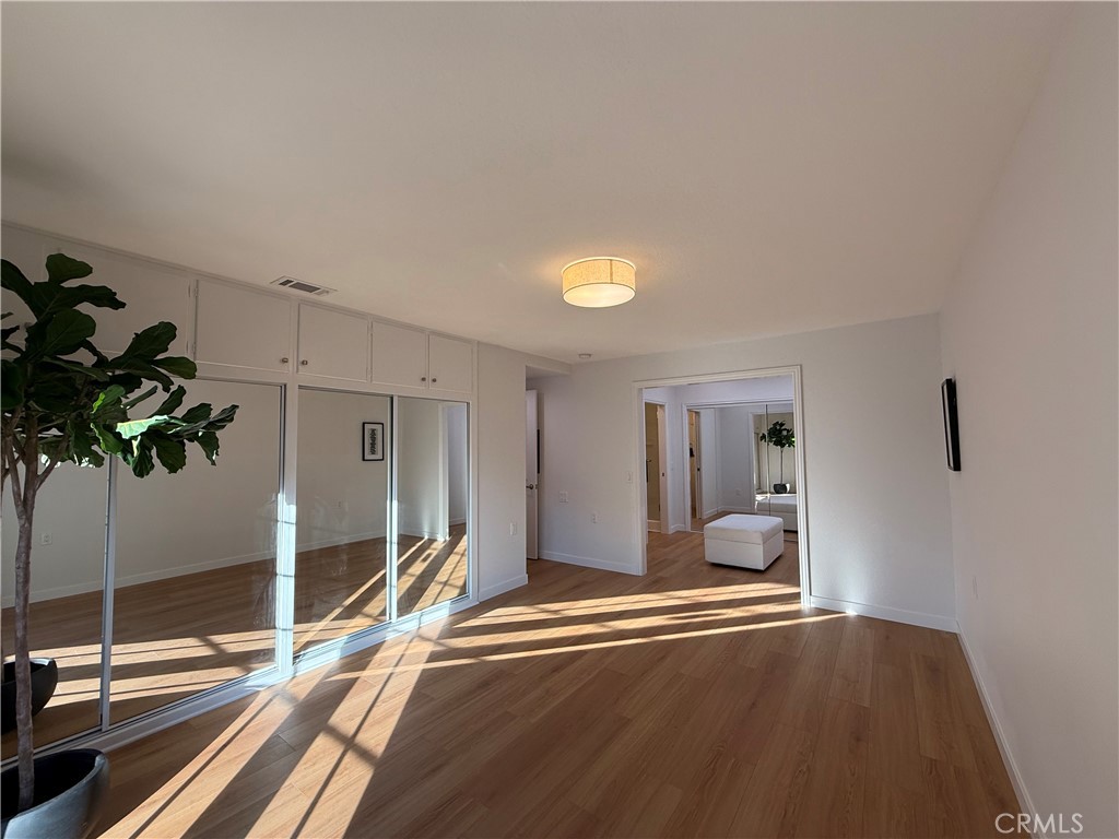 1921 St John Road, Unit 35C Seal Beach, CA 90740 - Photo 32 of 40 a living room with a furniture and a rug