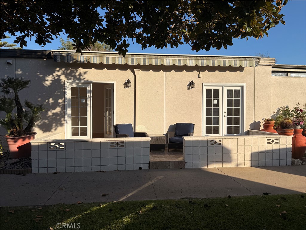 1921 St John Road, Unit 35C Seal Beach, CA 90740 - Photo 37 of 40 a view of a building with couches