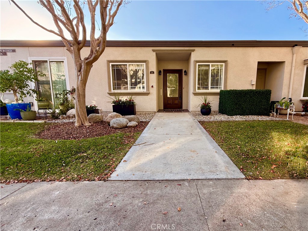 1921 St John Road, Unit 35C Seal Beach, CA 90740 - Photo 39 of 40 a view of a house with backyard porch and sitting area