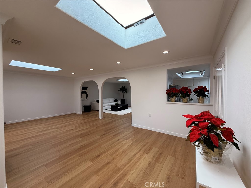 1921 St John Road, Unit 35C Seal Beach, CA 90740 - Photo 5 of 40 a view of a room with wooden floor